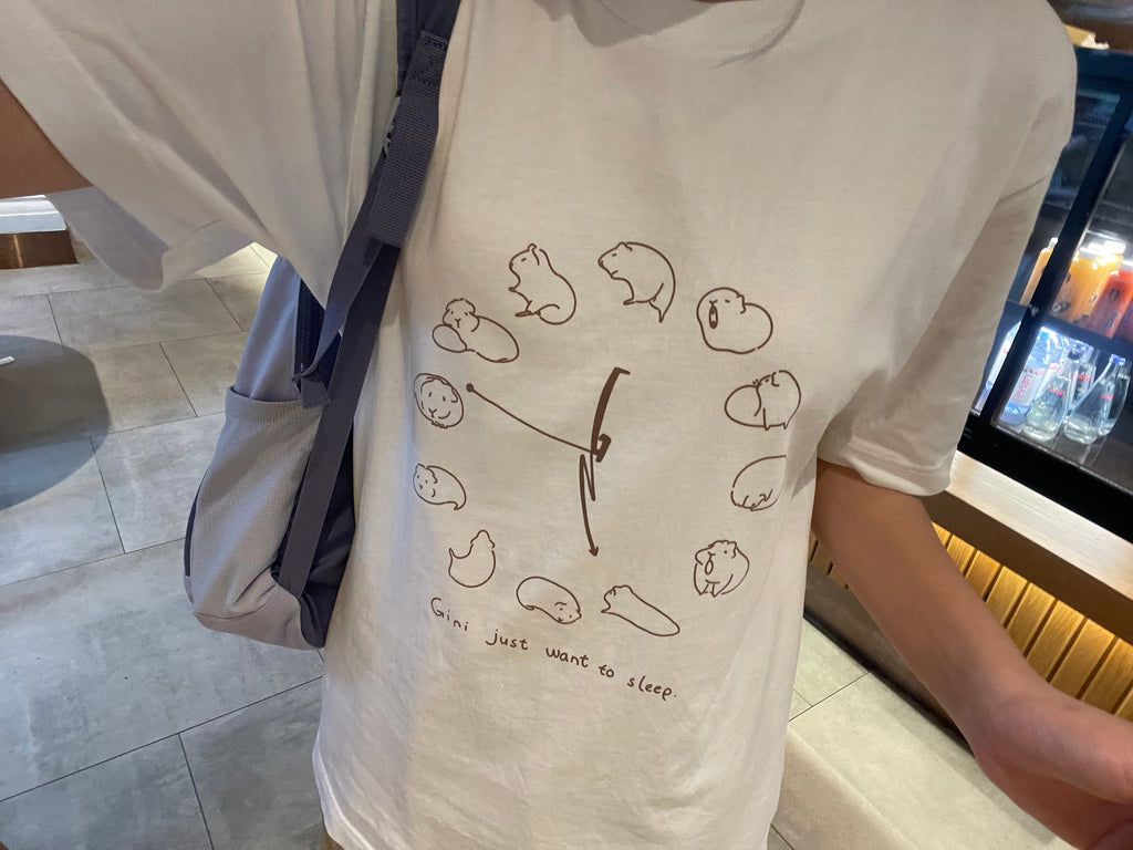 「ねむねむジーニー」時計柄コットンTシャツ