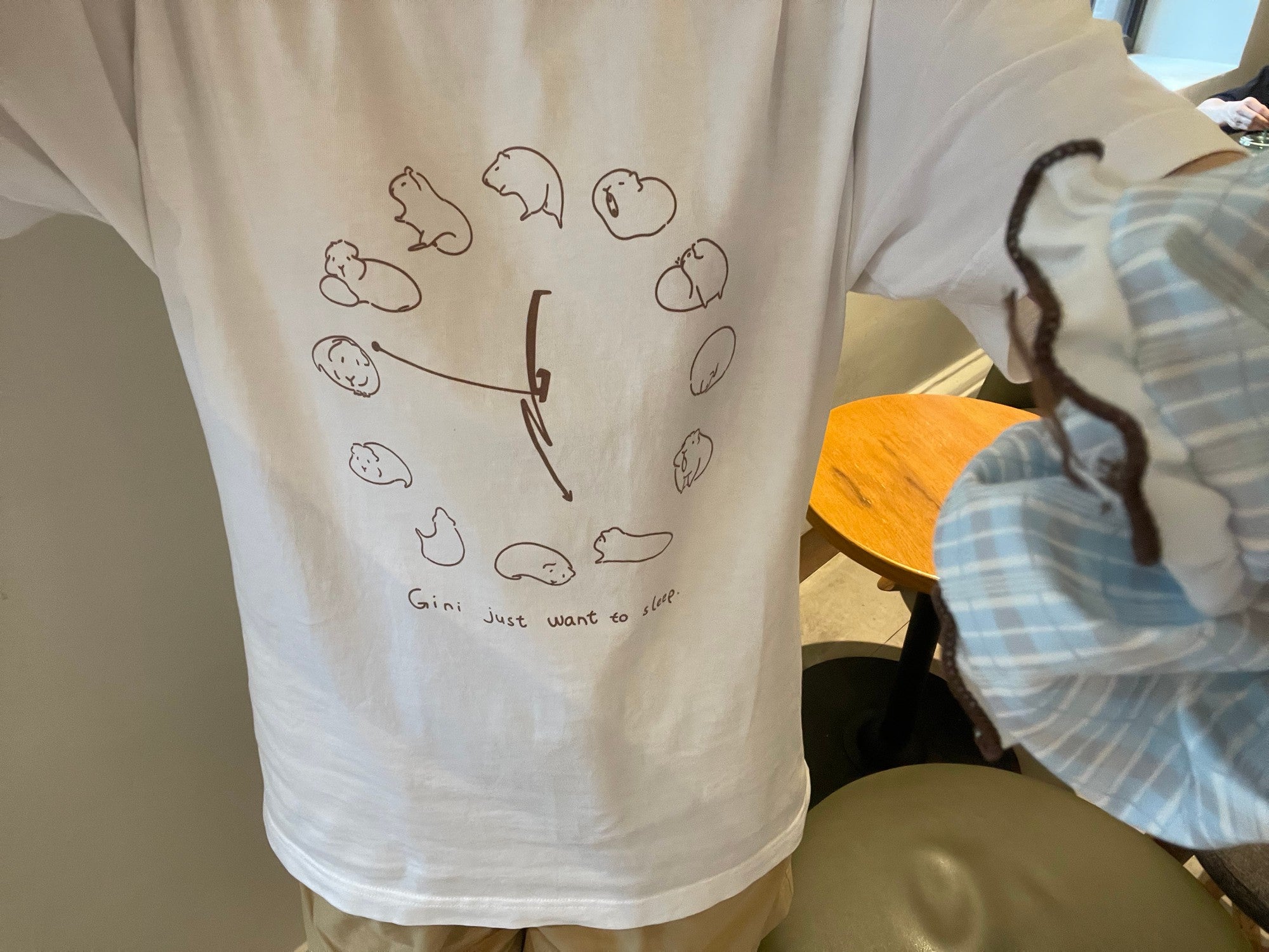 「ねむねむジーニー」時計柄コットンTシャツ