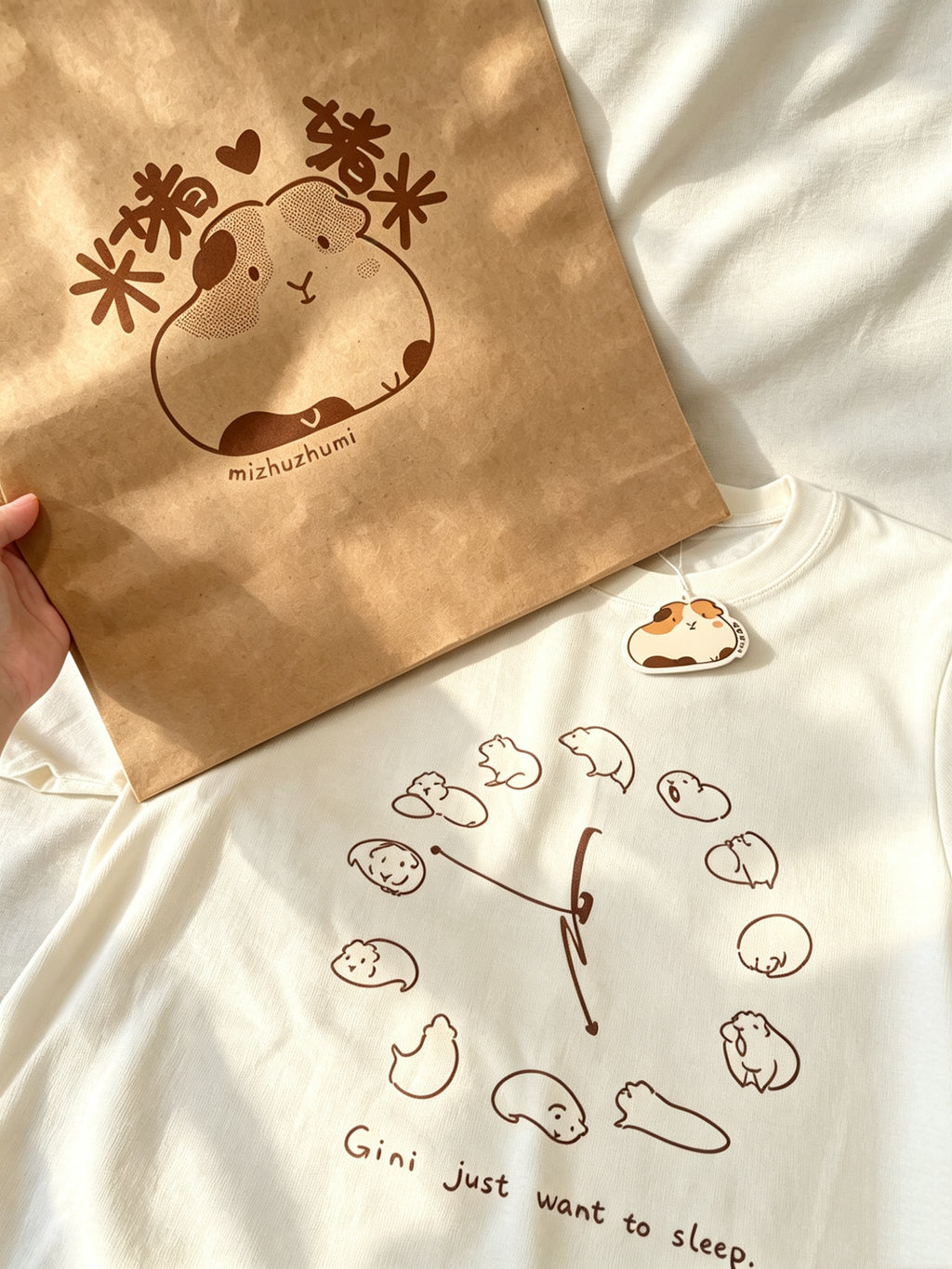 「ねむねむジーニー」時計柄コットンTシャツ